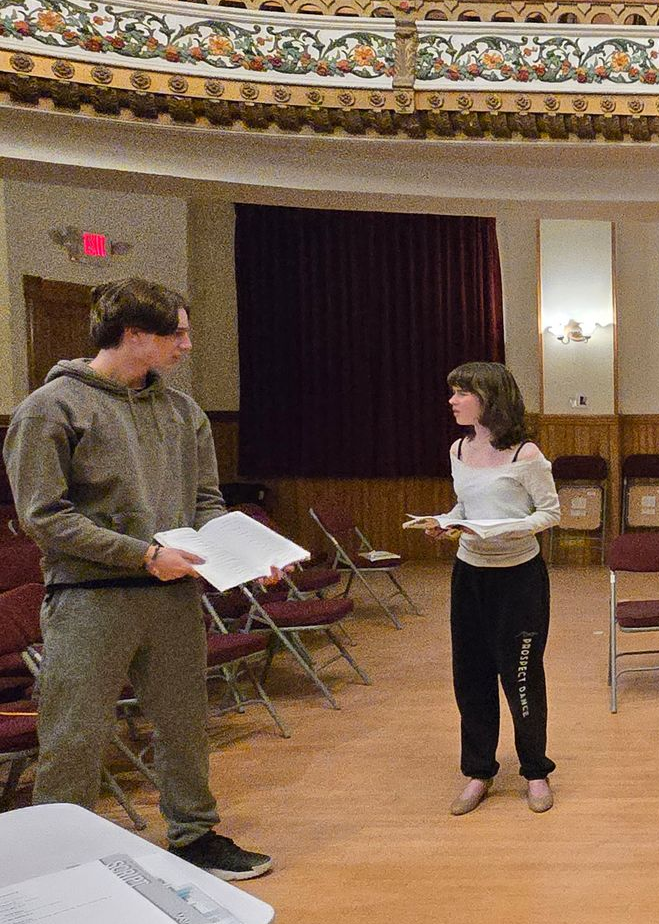 A group of young actors practicing