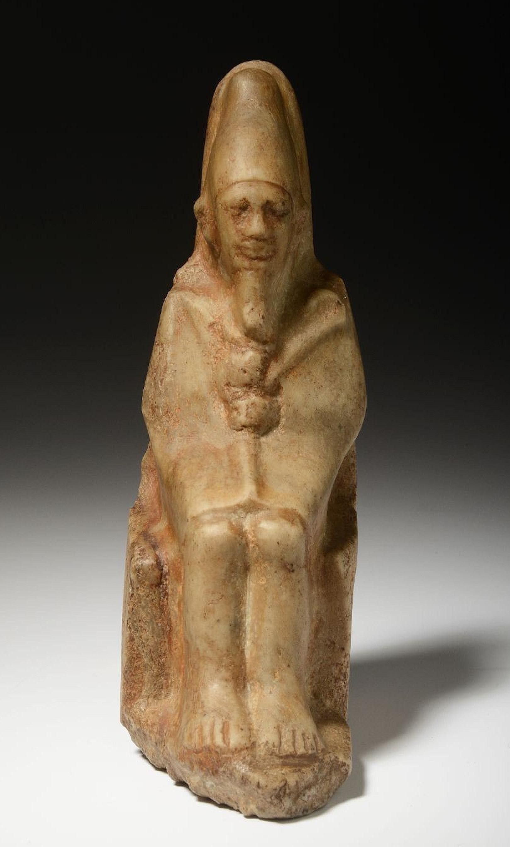 Nynetjer, third pharaoh of Egypt’s Second Dynastywith ancient Egyptian royal symbols and hieroglyphs