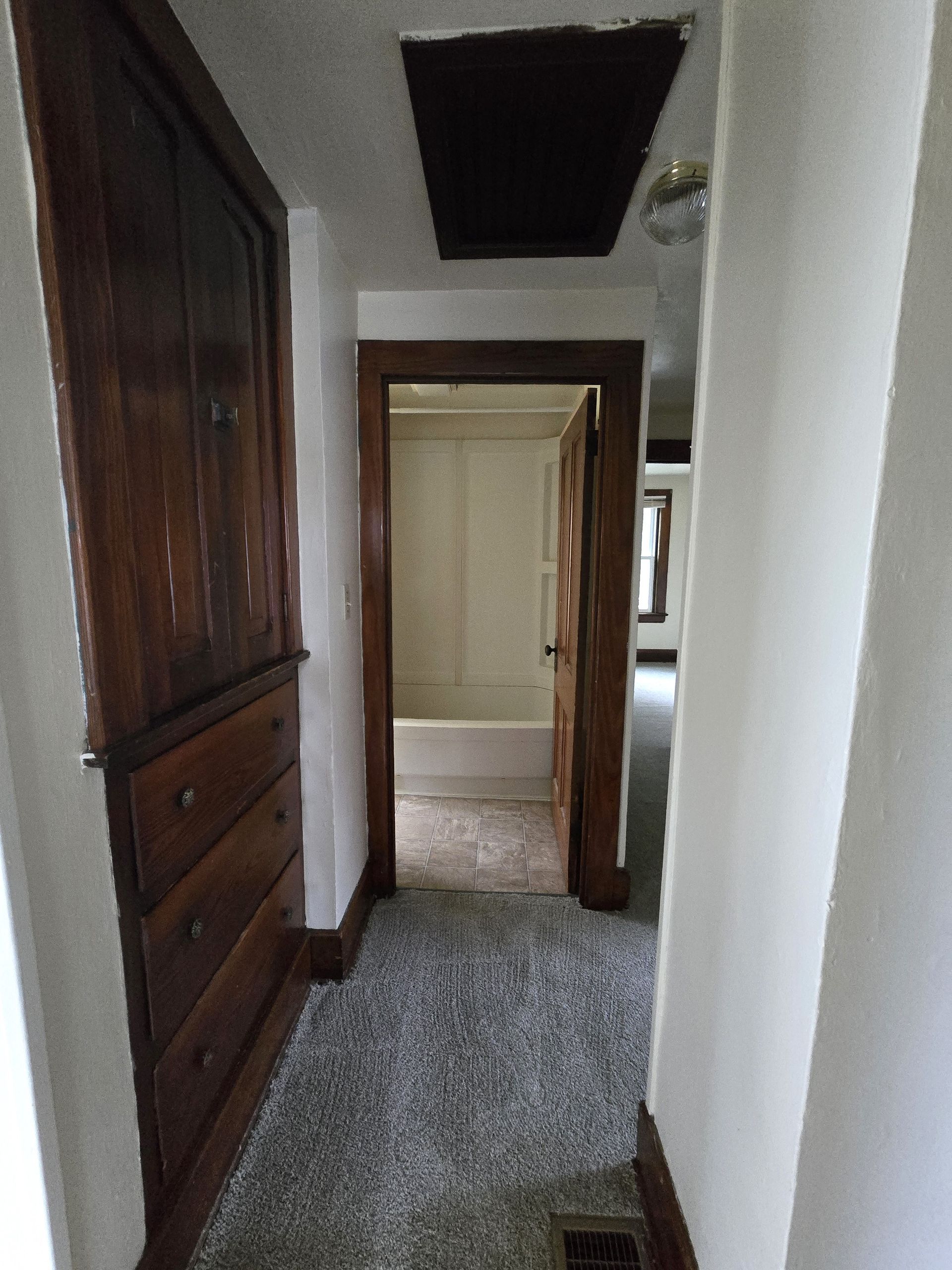 Urban Corner 111 - Hallway upstairs to left