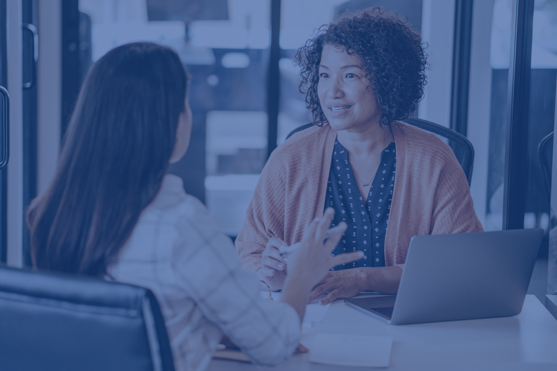 An MSP owner reviewing a checklist of interview questions before meeting with a fractional CMO