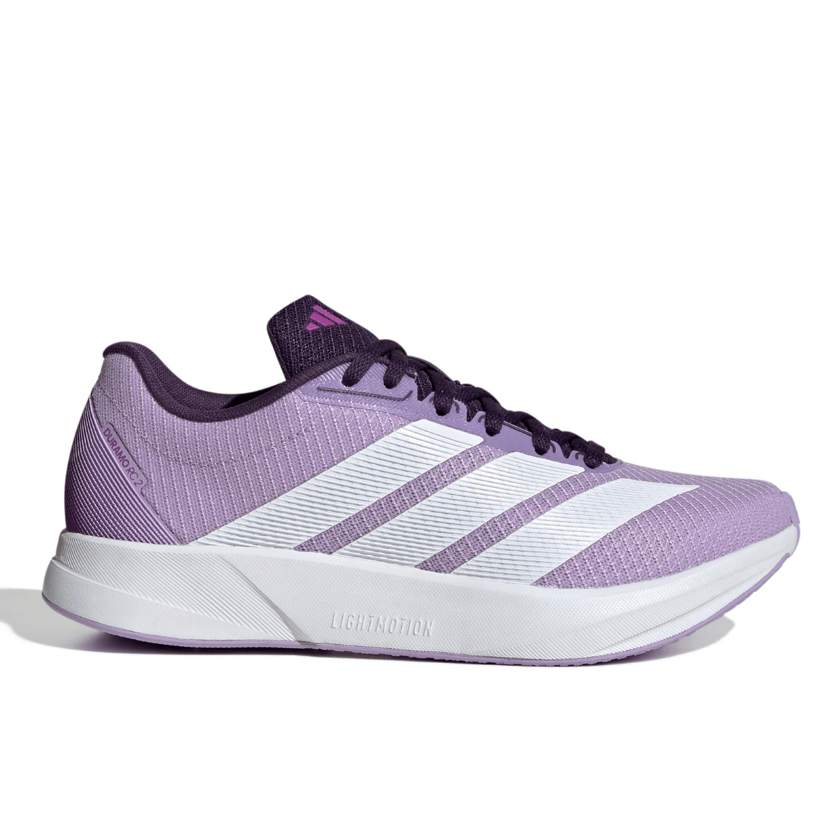 Zapatillas deportivas moradas para correr con rayas blancas y suela blanca, vista lateral.