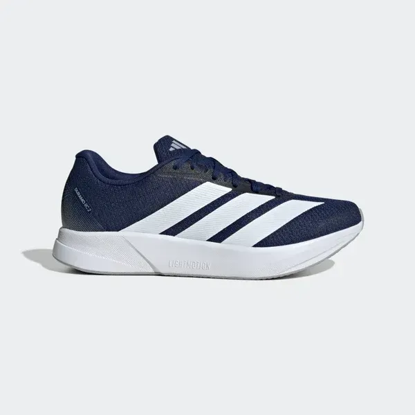 Zapatillas deportivas azul marino y blancas con tres rayas sobre fondo blanco.