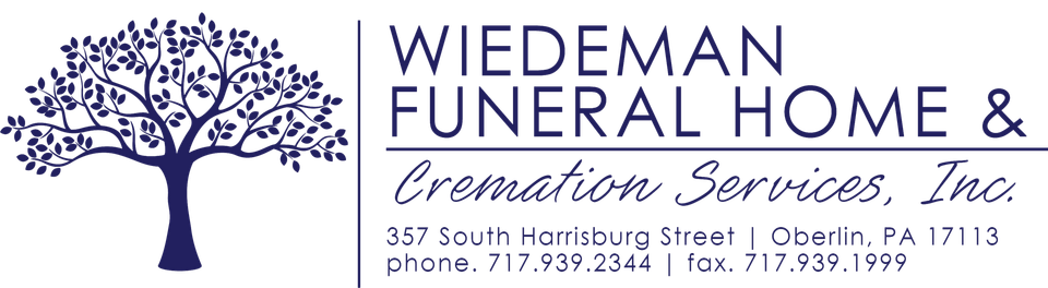 A logo for wiedeman funeral home and cremation services