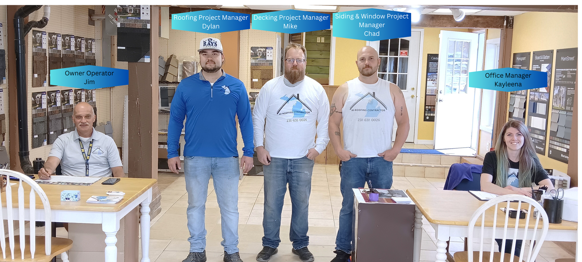 A group of men standing next to each other in a room.
