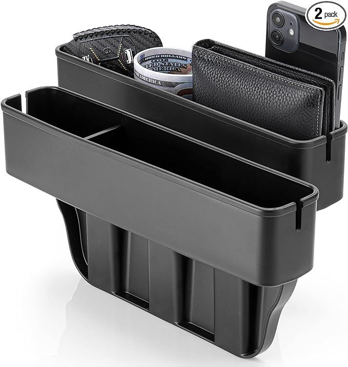 A car seat organizer with a cell phone and wallet in it.