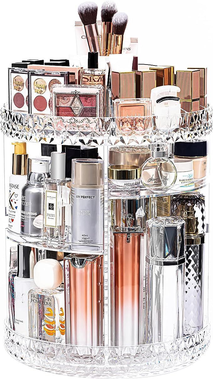 A cosmetic organizer filled with lots of cosmetics and brushes.