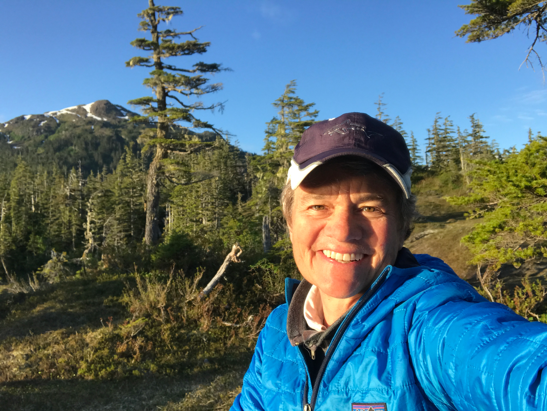 Copywriting Katie Hickey out researching best camp spots while kayaking in Prince William Sound, AK.