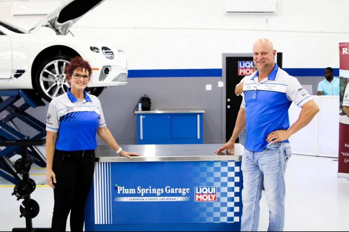 Our team on grand opening | Plum Springs Garage