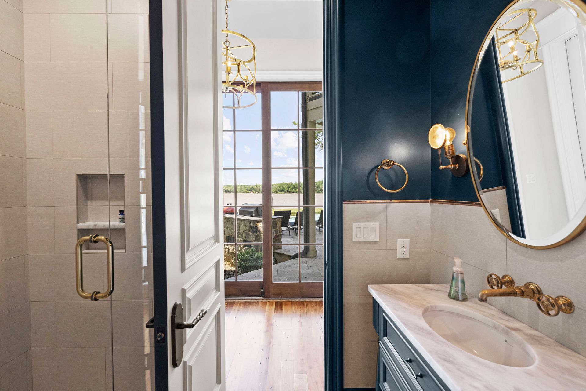 a bathroom with blue walls and a sink | Charlotte, NC | Harland Building Group 