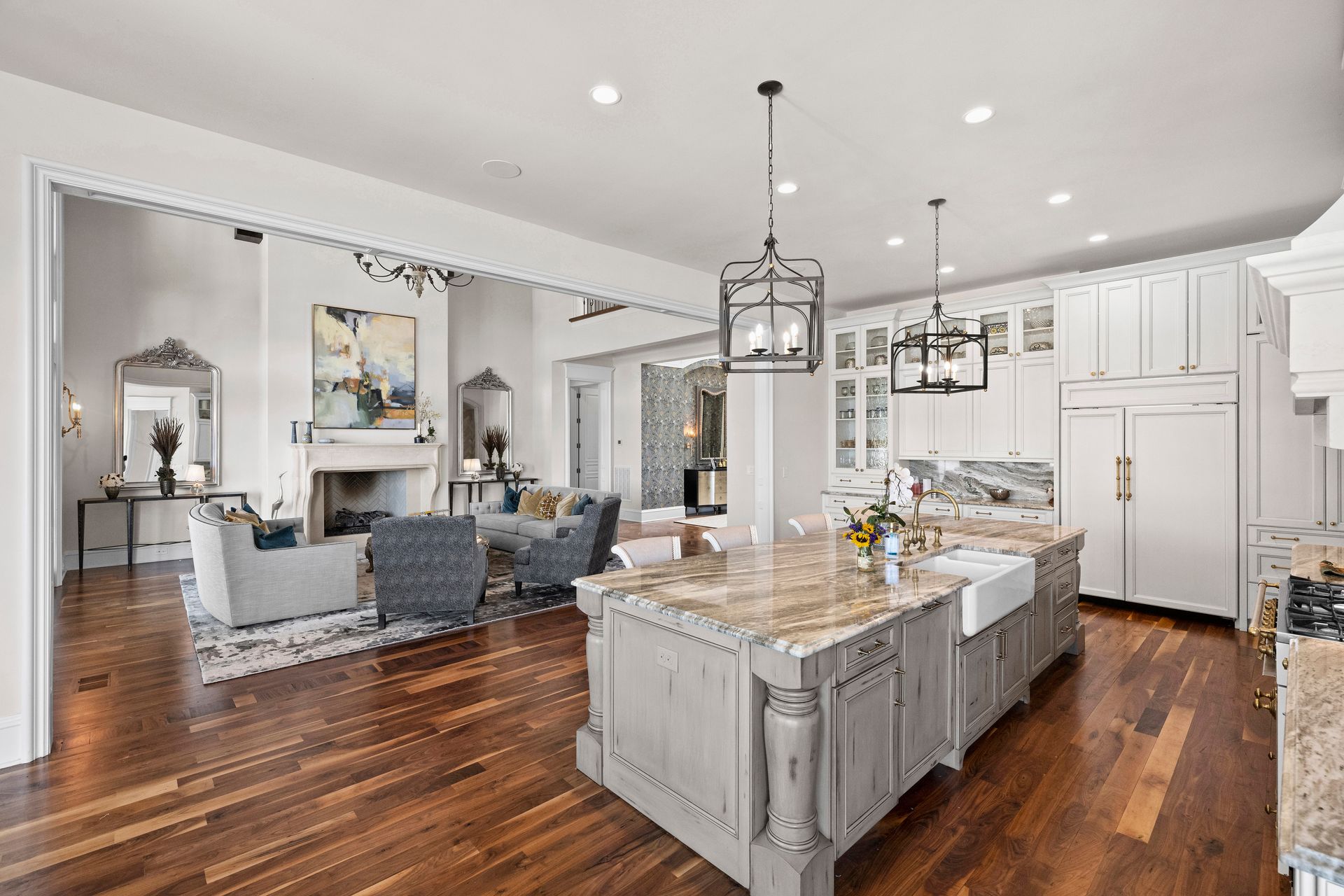 a kitchen with a large island and a sink | Charlotte, NC | Harland Building Group 