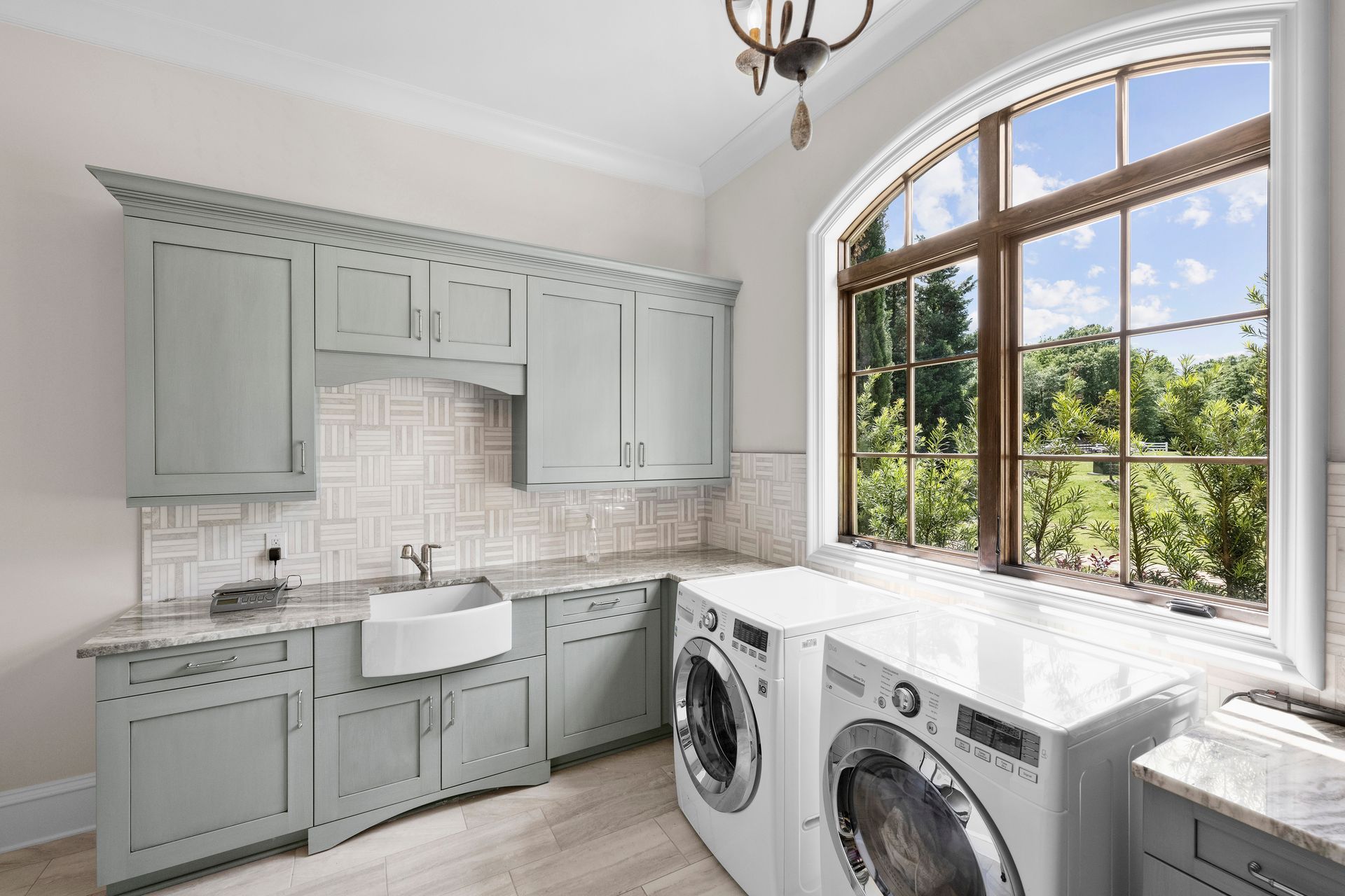 a laundry room with an lg washer and dryer | Charlotte, NC | Harland Building Group 