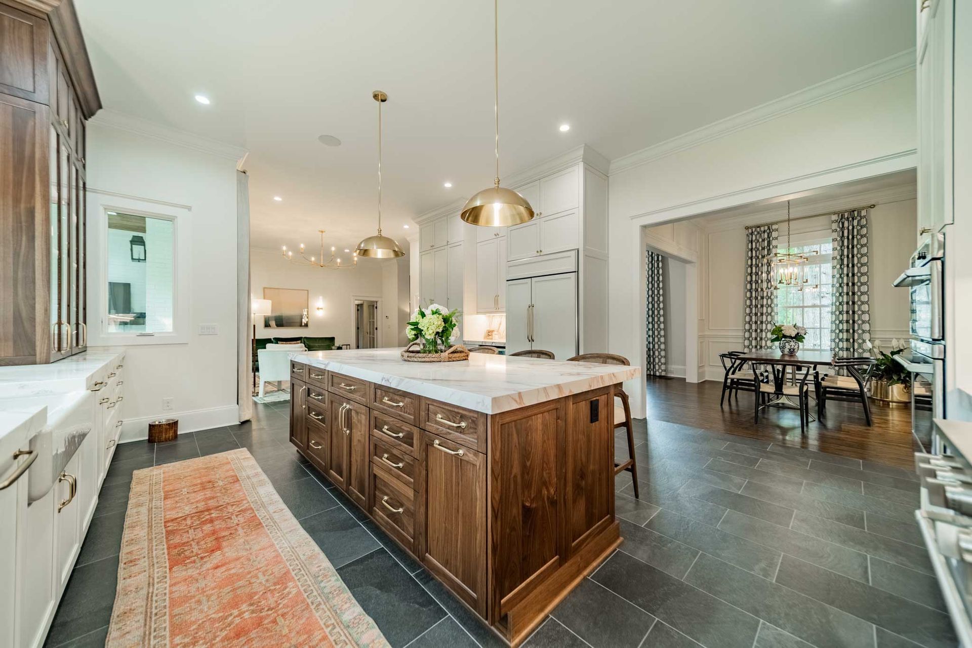 There is a large island in the middle of the kitchen.