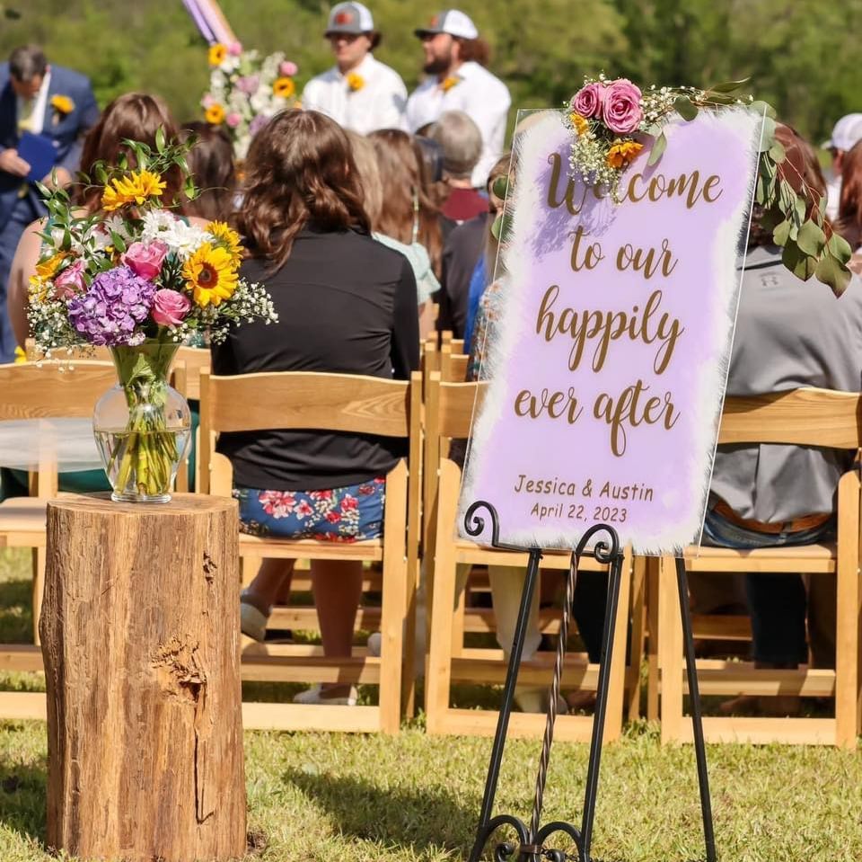 A sign that says welcome to our happily ever after