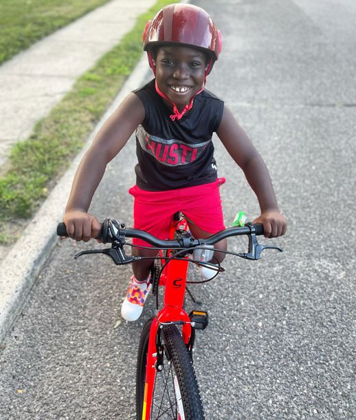 happy boy learn how to ride