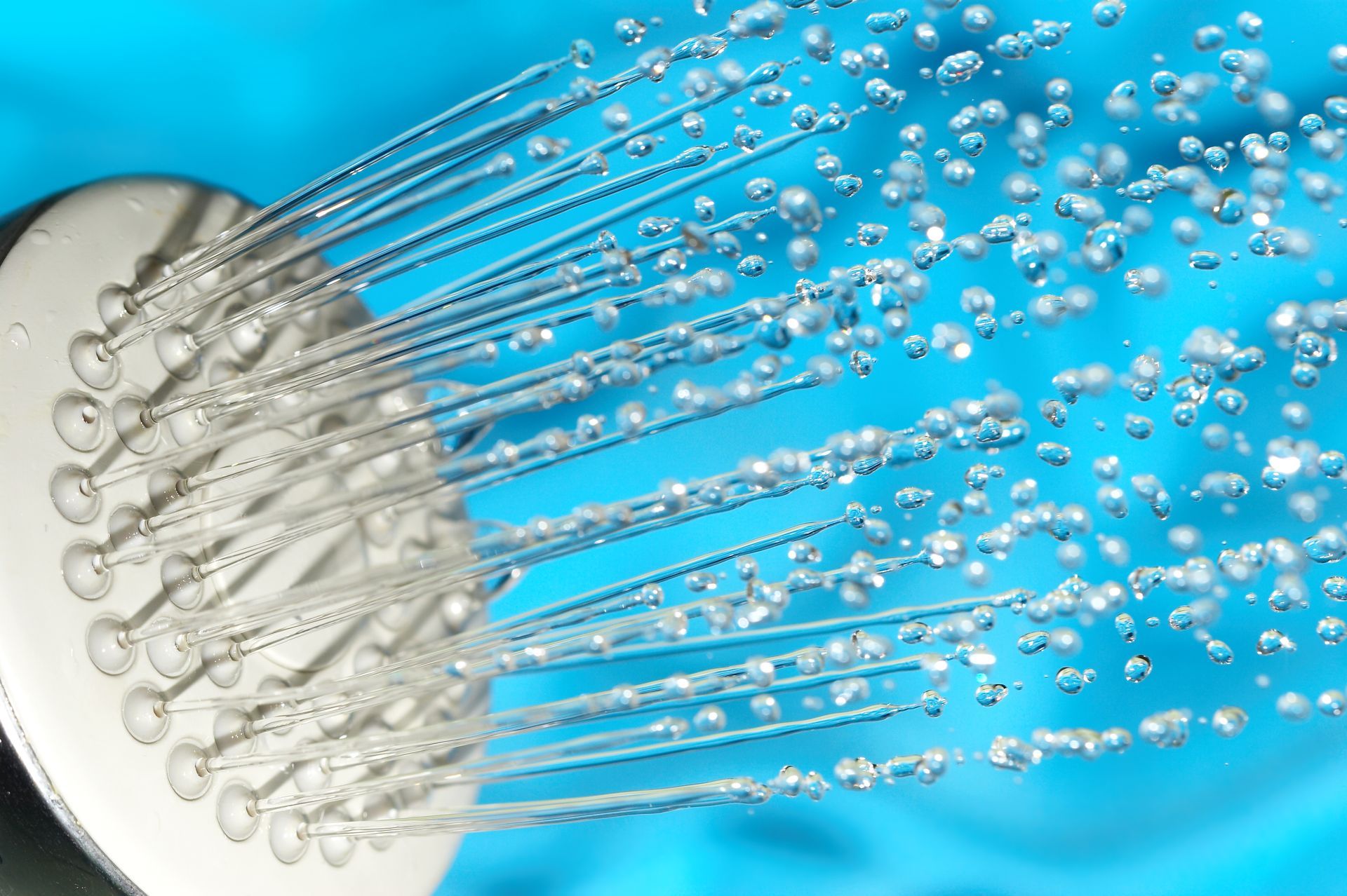 Shower head spraying hot water
