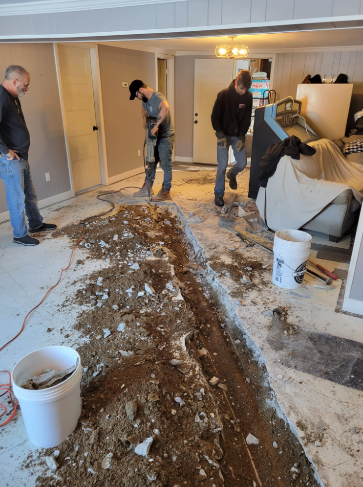Breaking up concrete to install a new sewer line