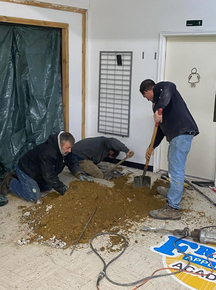 Replacing dirt over new sewer line