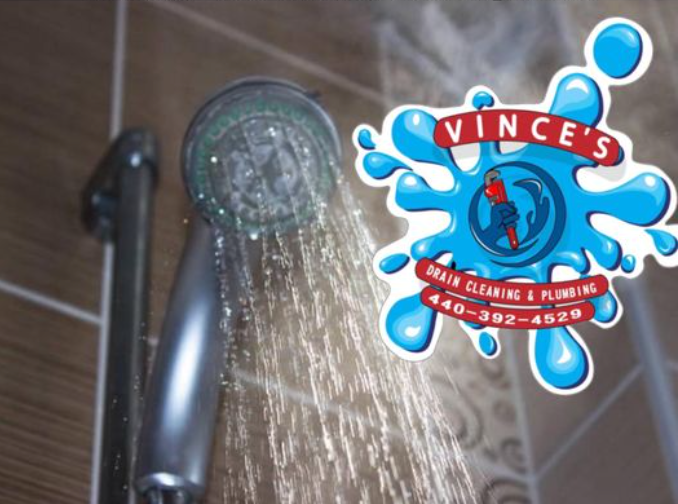 Shower head with hot water coming out.