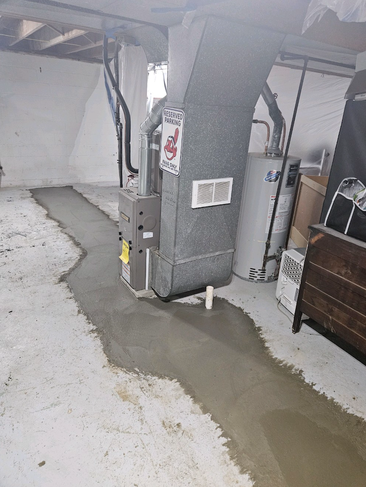 Finished concrete after installing new sewer line.