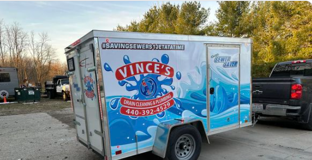 Vince's plumbing trailer with equipment and parts for plumbing repair.