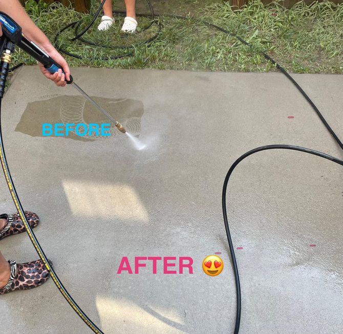 Professional pressure washing service on a residential driveway in Winston-Salem NC