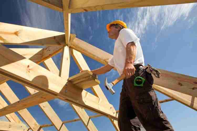 builder on a roof
