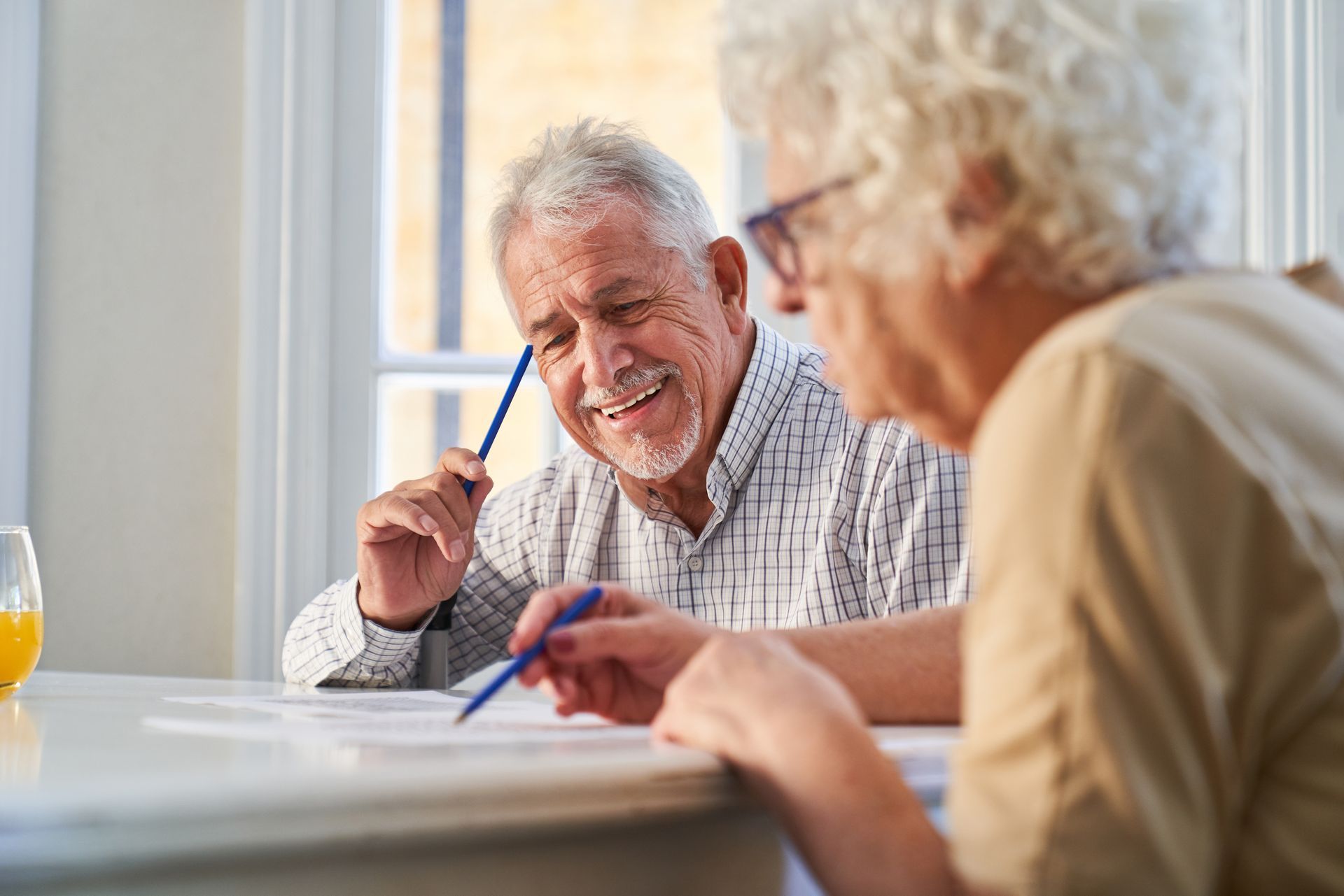 Elderly couple at a table