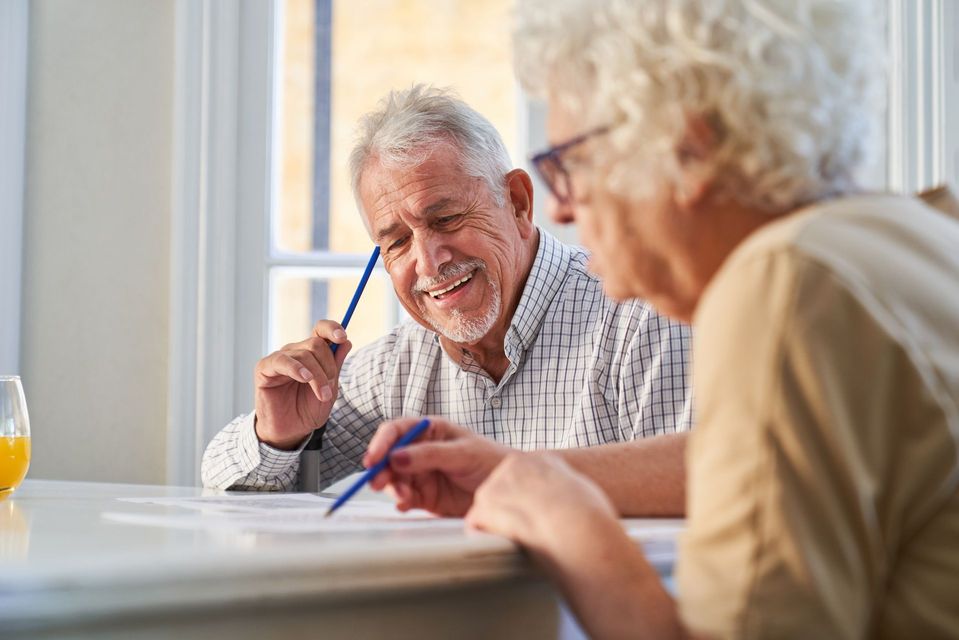 Elderly couple at a table