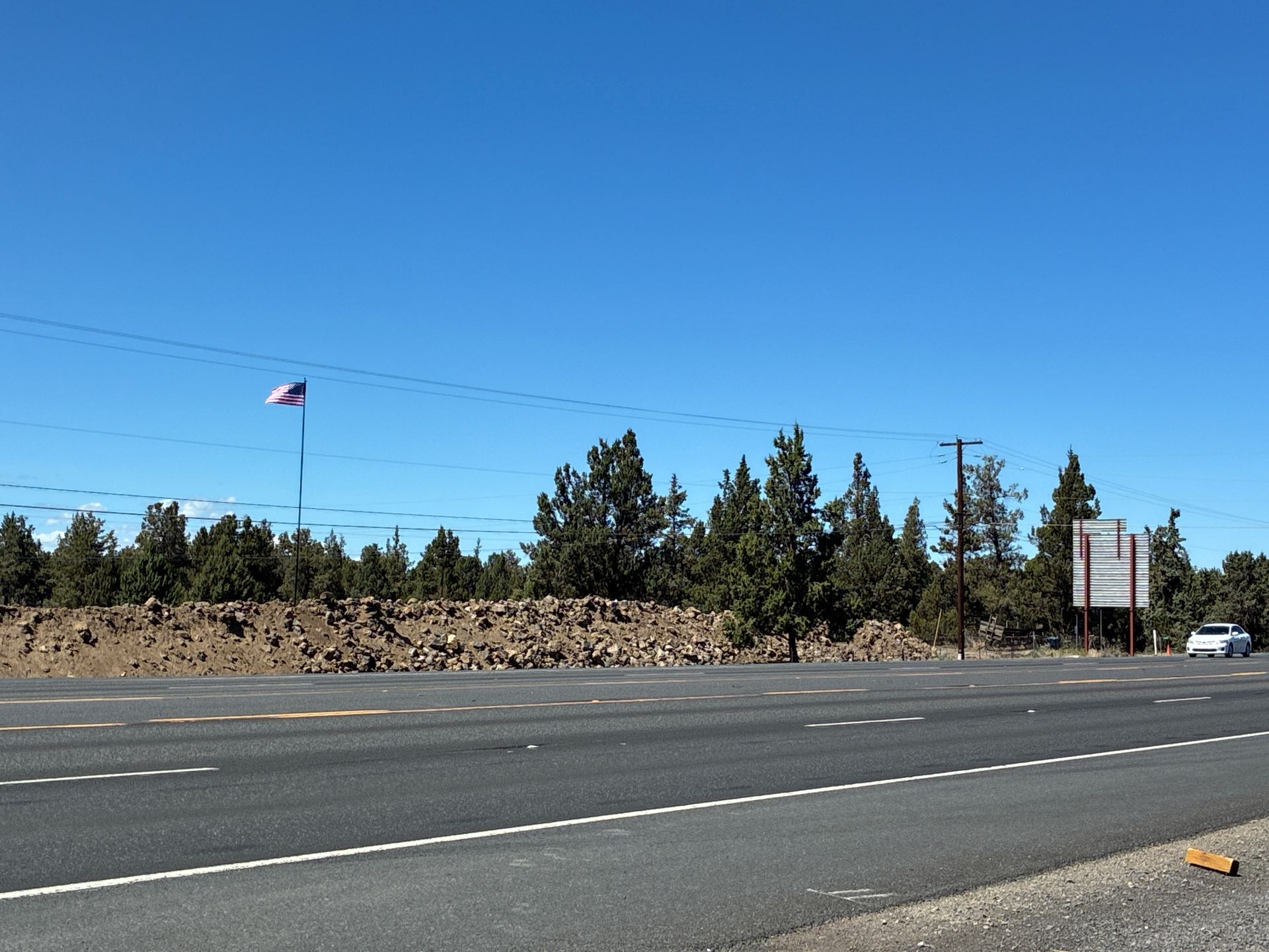 Dry campsite among juniper trees at Roadhouse Ranch & Camp near Bend, Oregon, close to Highway 97.