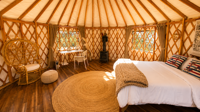Heated furnished yurt interior at Roadhouse Ranch & Camp, a Bend base for winter trips to Mt. Bachelor.