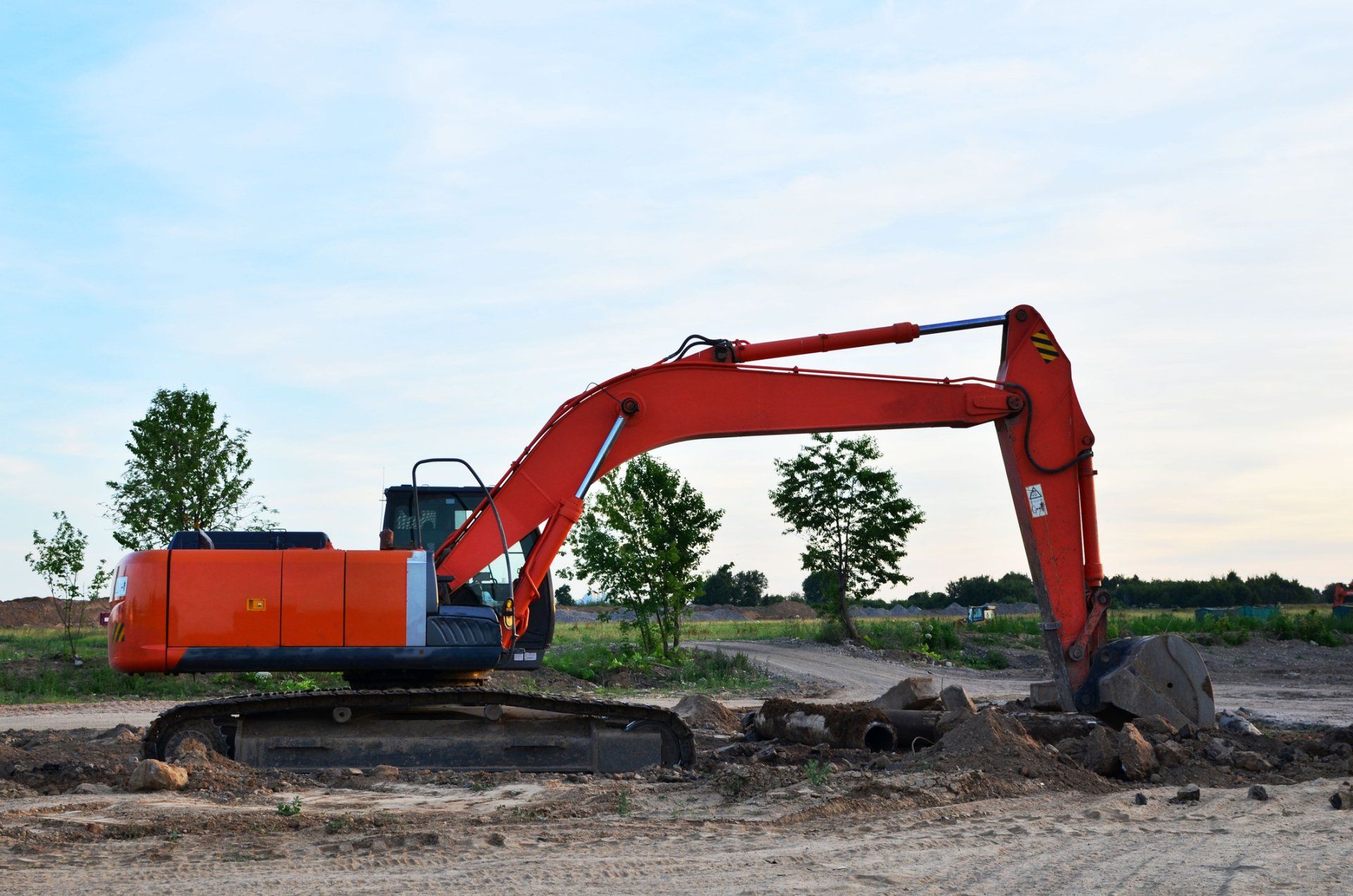 Excavator at a construction site | Birch Run, MI | Duane Jones Excavating