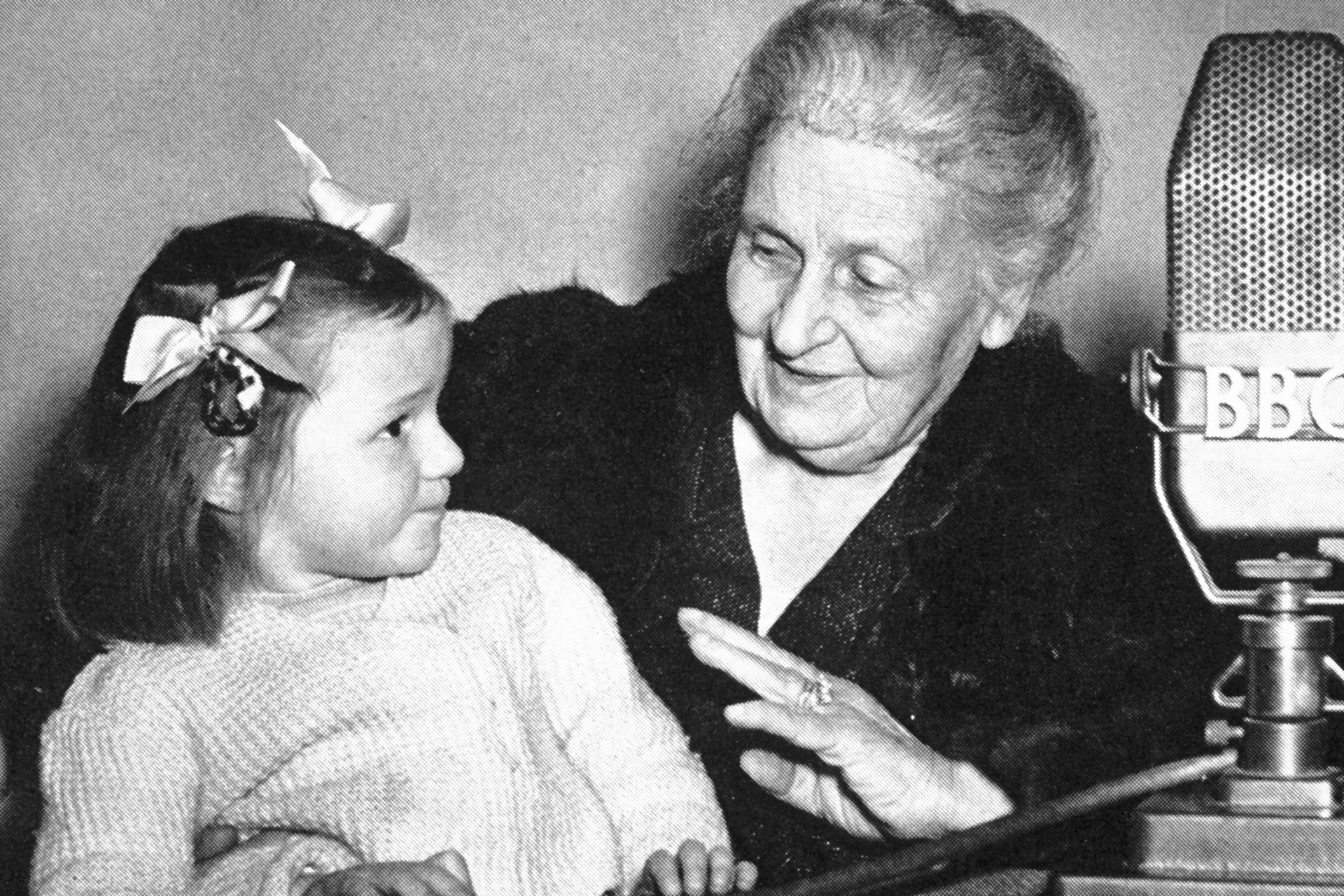 Maria Montessori and a young child. 