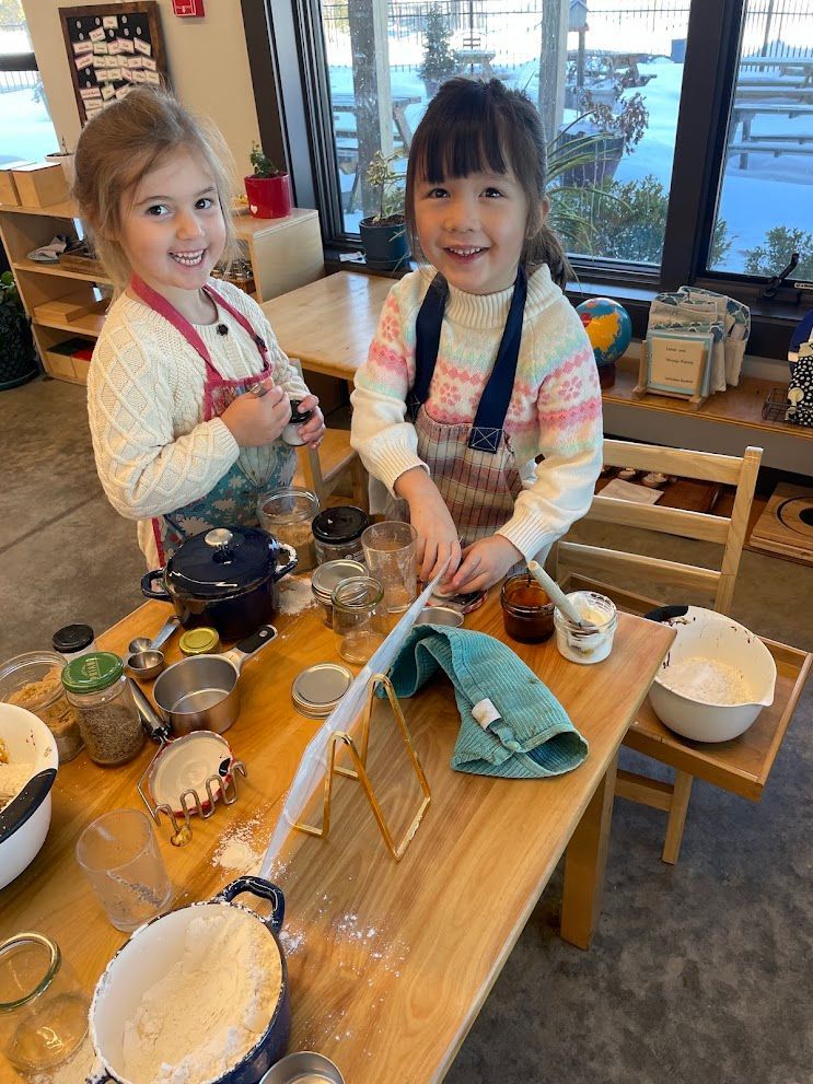 Two IMA students enjoy a new baking recipe! 
