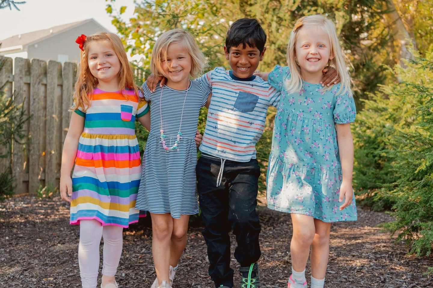 Montessori children together outside