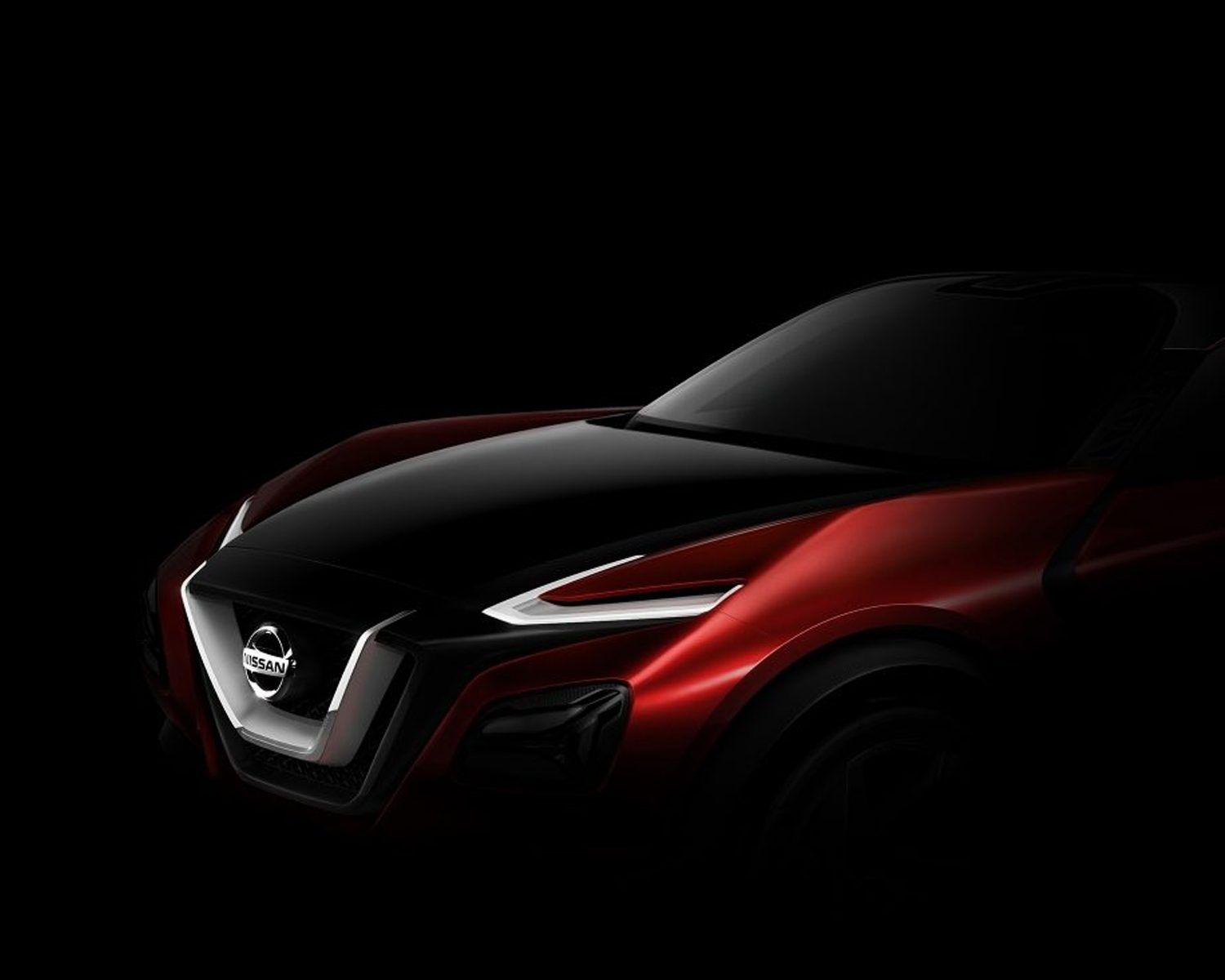 Un prototipo de Nissan rojo y negro sobre un fondo oscuro.