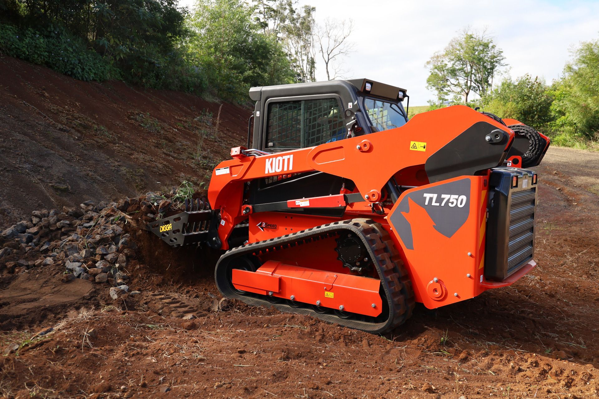 A small bulldozer is parked on the side of the road.