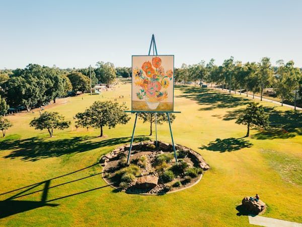 A Green Field With A High Statue In The Middle — Reed Plumbing Industries in Emerald, QLD