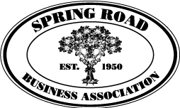 A black and white logo for spring road business association