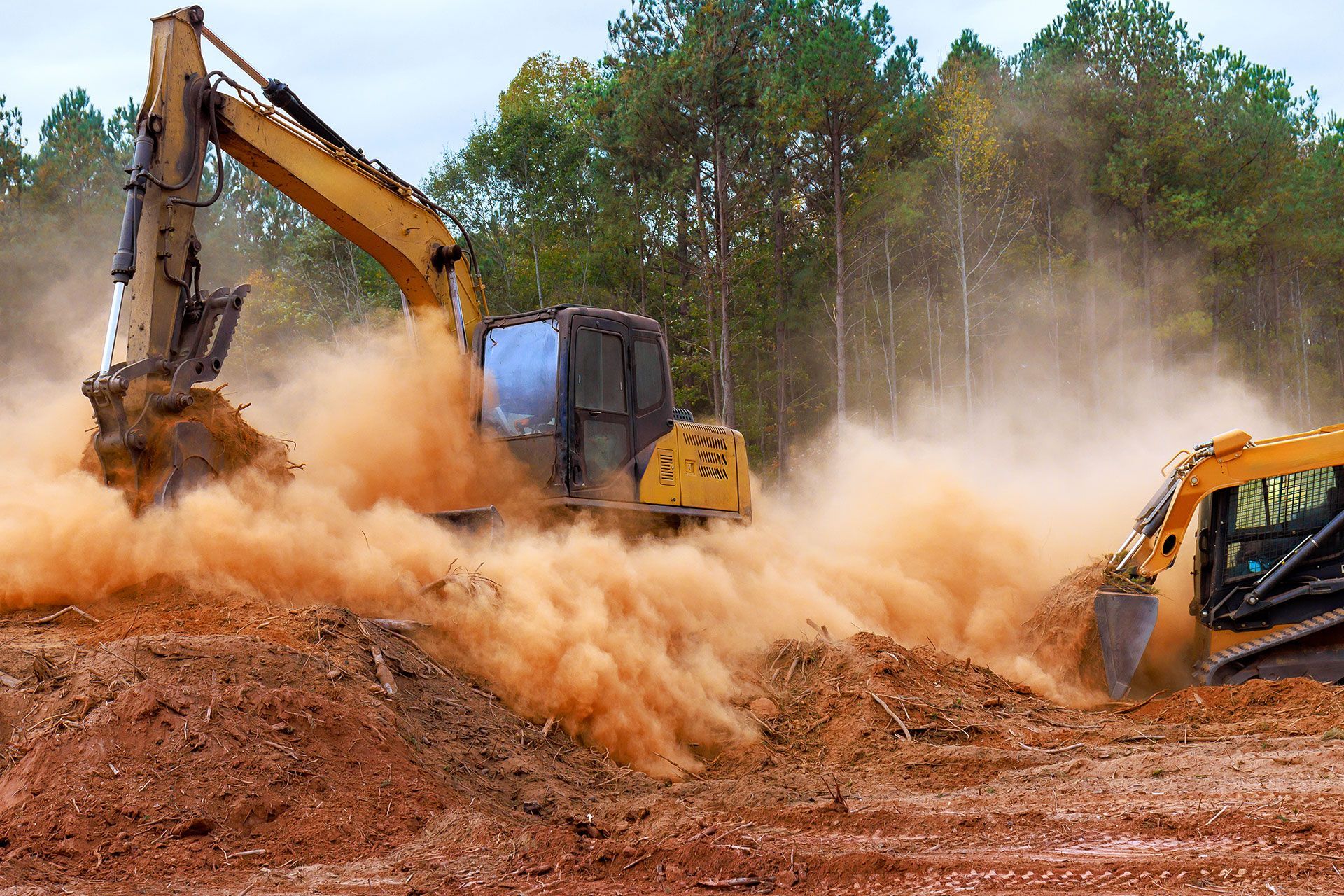 Excavator and bulldozer
