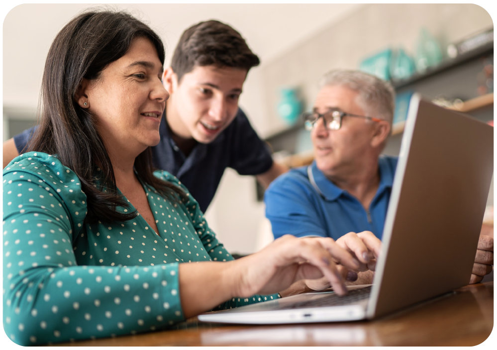 Family making payment on laptop