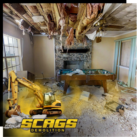 A demolished interior with scags excavator