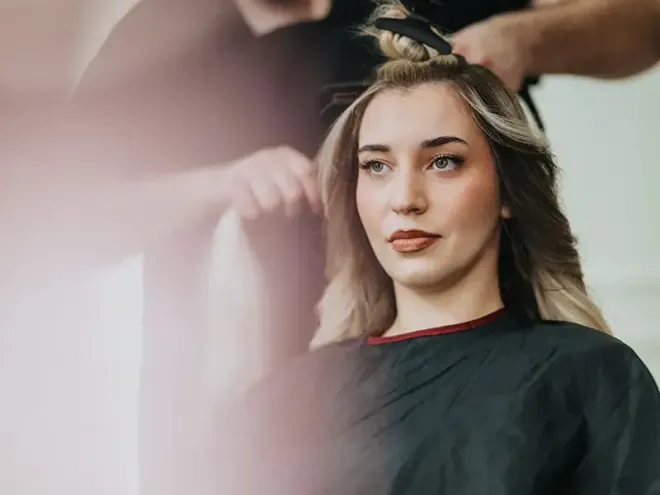 Woman getting her hair cut and colored at the Bella Terra Plaza Beauty Salon