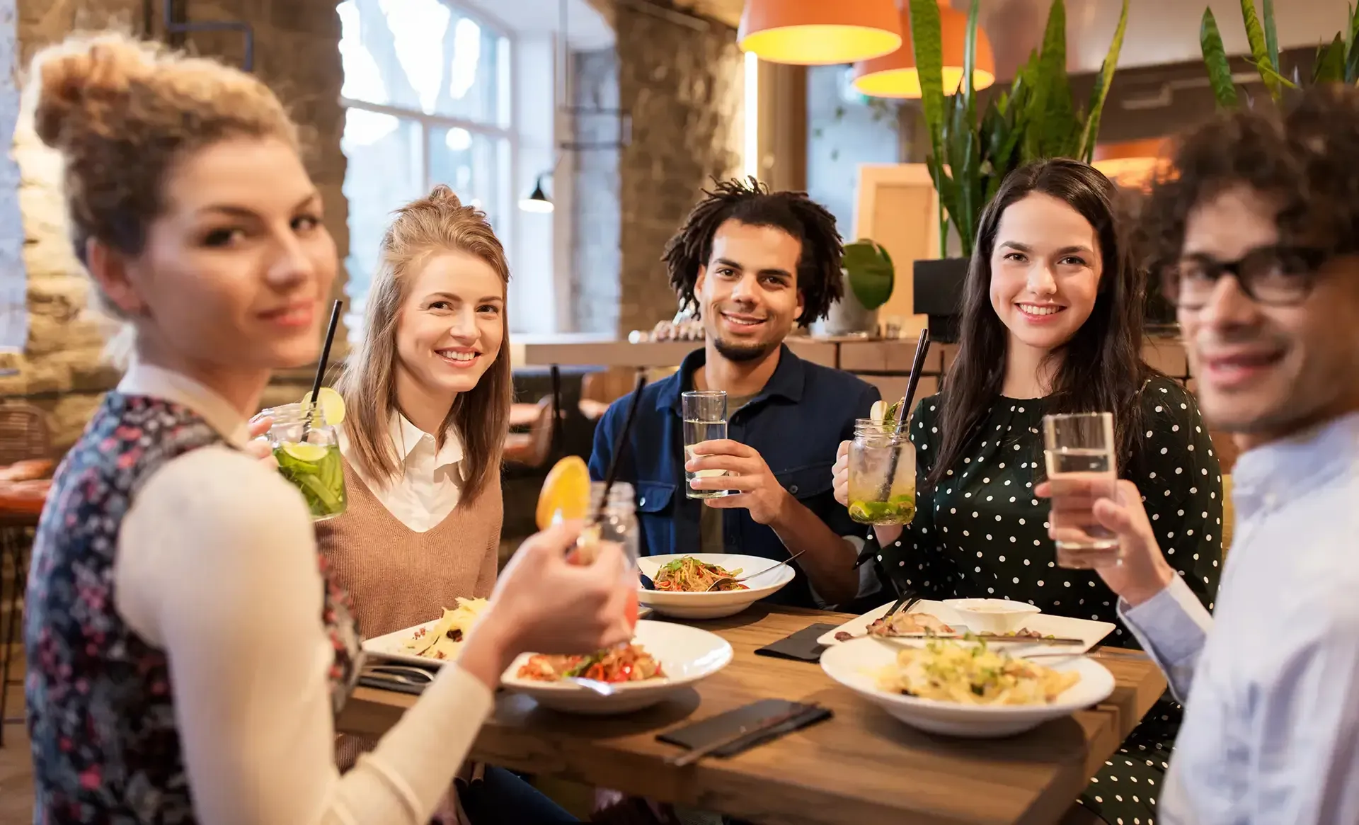 Group of friends having dinner together at the Bella Terra Plaza. 
