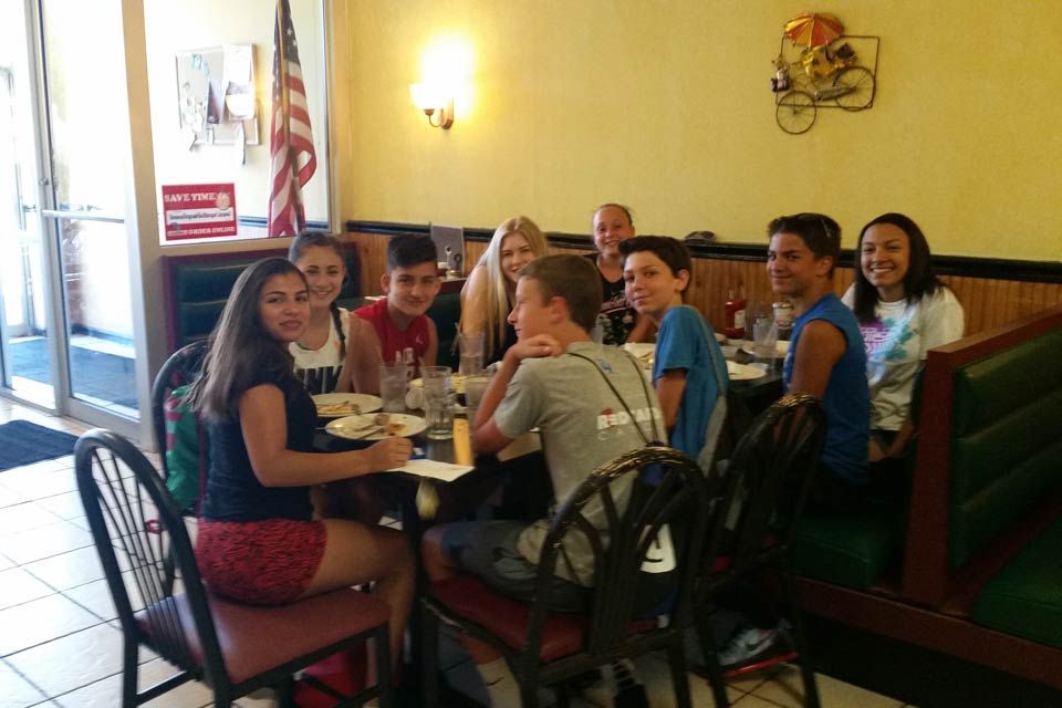 group of people sitting at restaurant