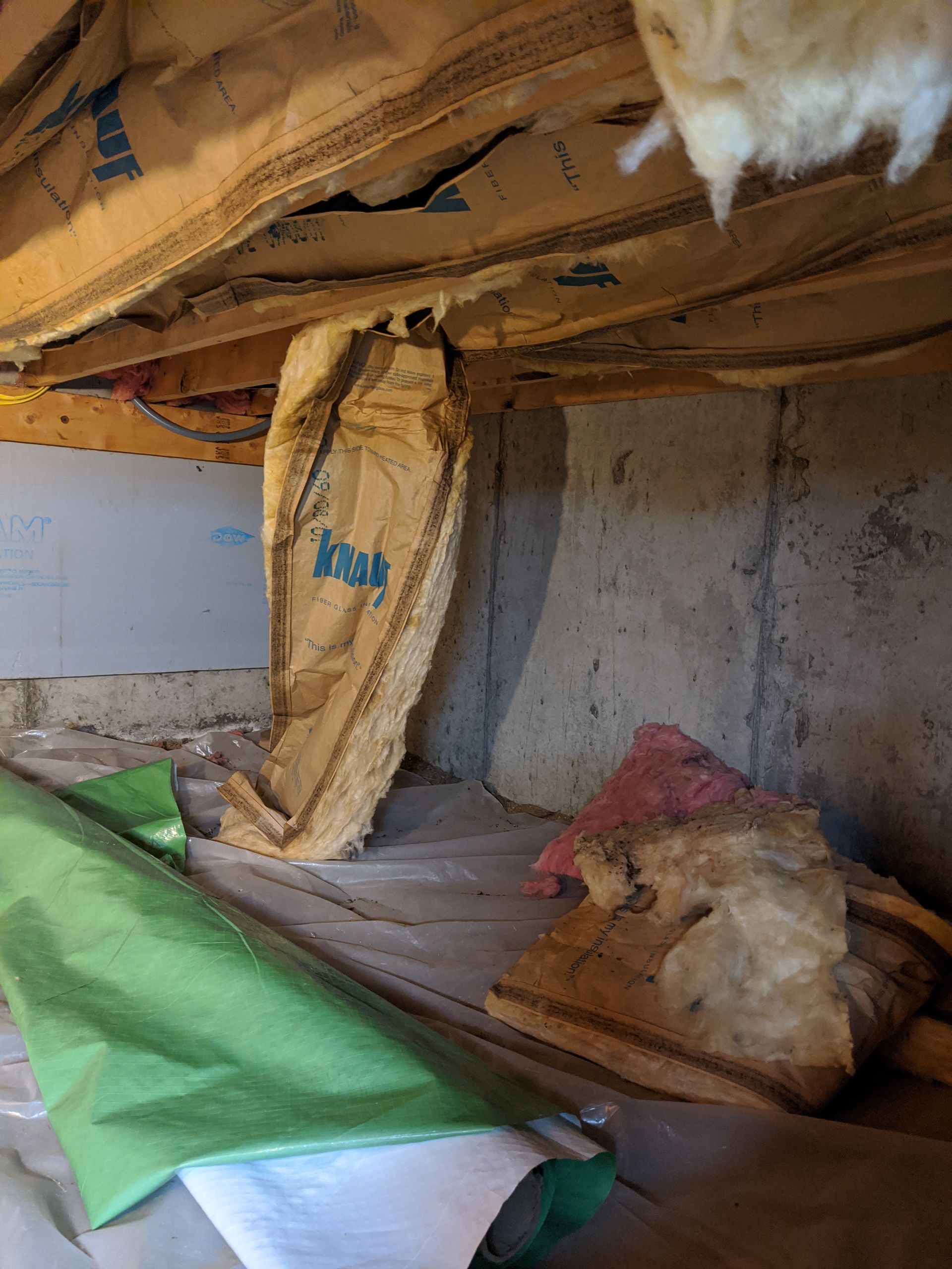 there is a lot of insulation in the ceiling of a basement prior to the crawl space being sealed