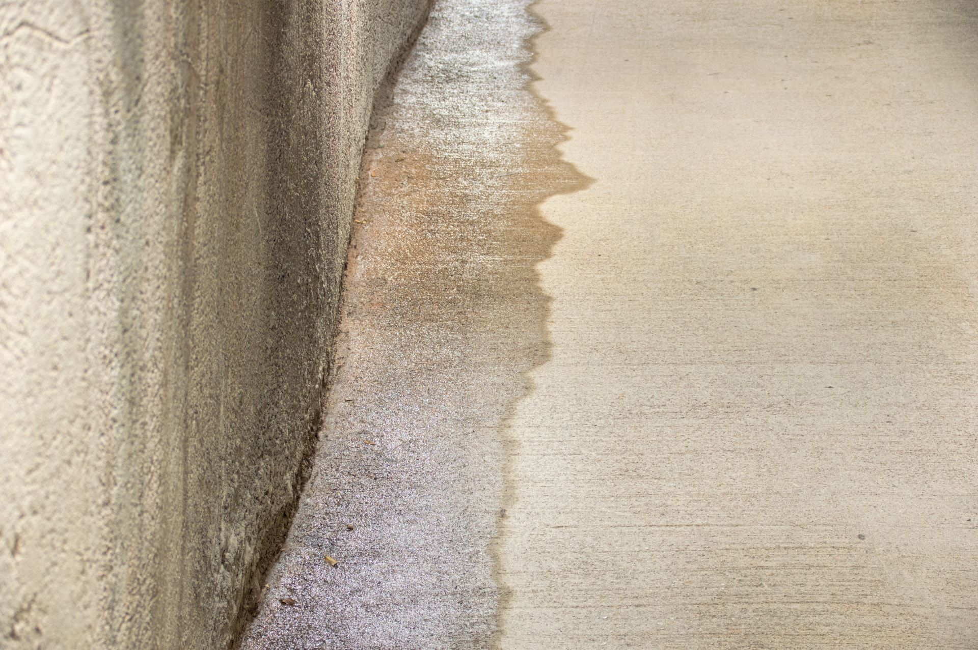 a basement floor with a lot of water damage