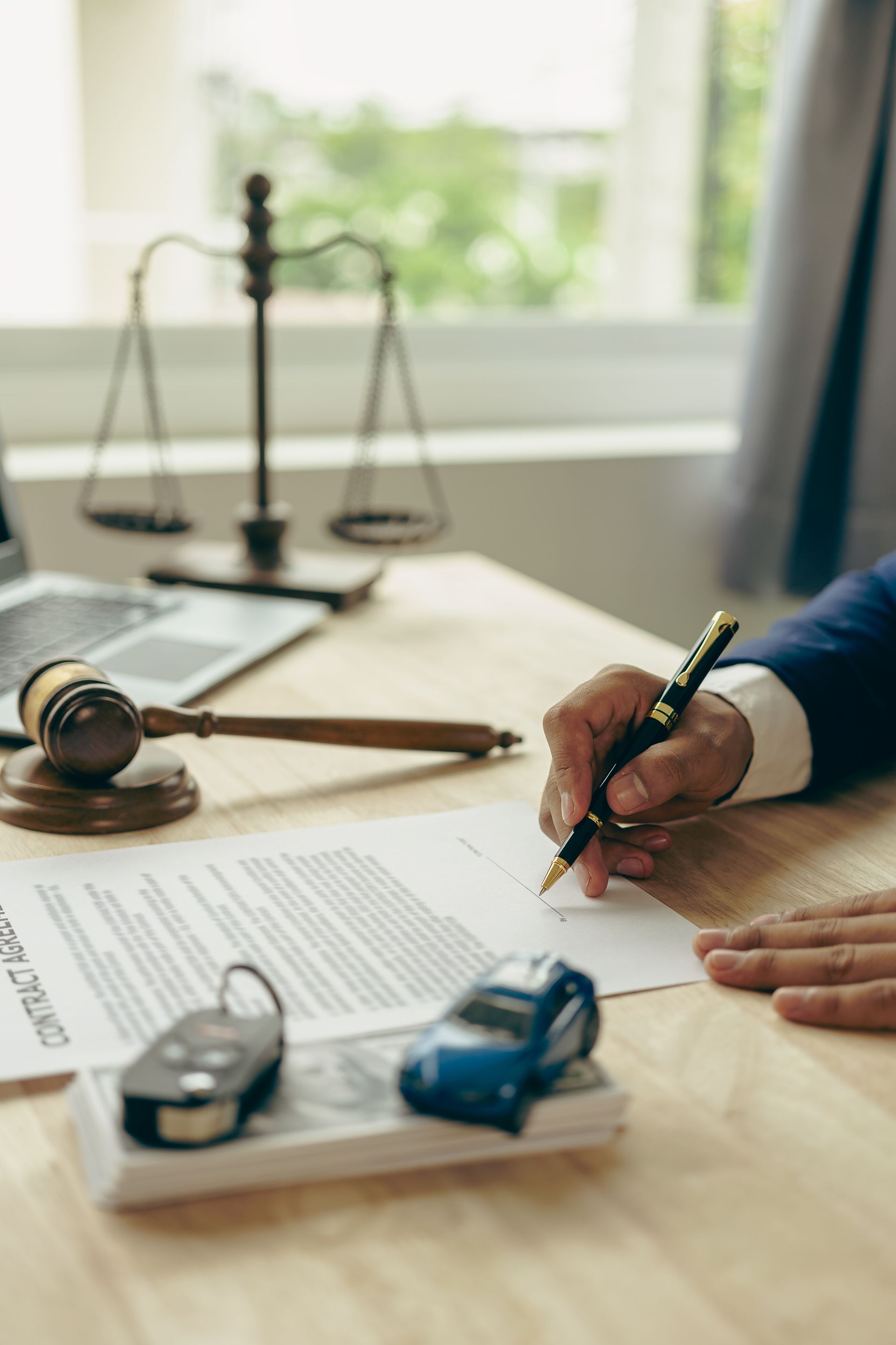 Car accident and hammer case on table or bail court case. Car accident and hammer case on table or bail court case.
