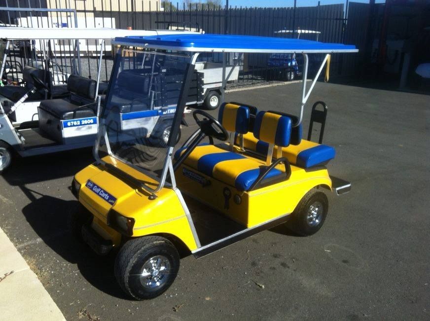 Yellow and Blue golf cart for hire — DTM Tamworth in Tamworth, NSW