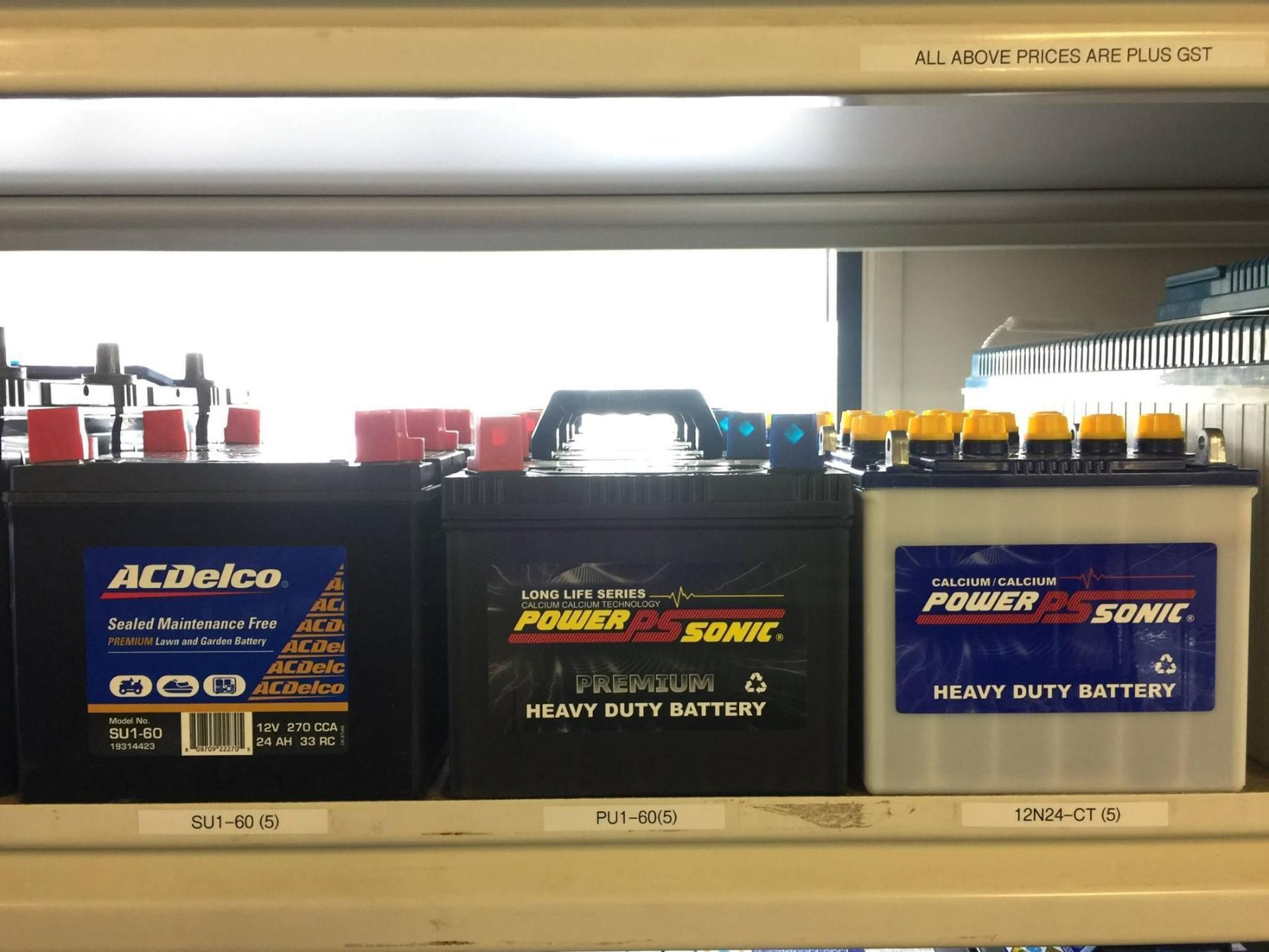 Three Batteries Are Sitting on A Shelf in A Store — DTM Tamworth in Armidale, NSW