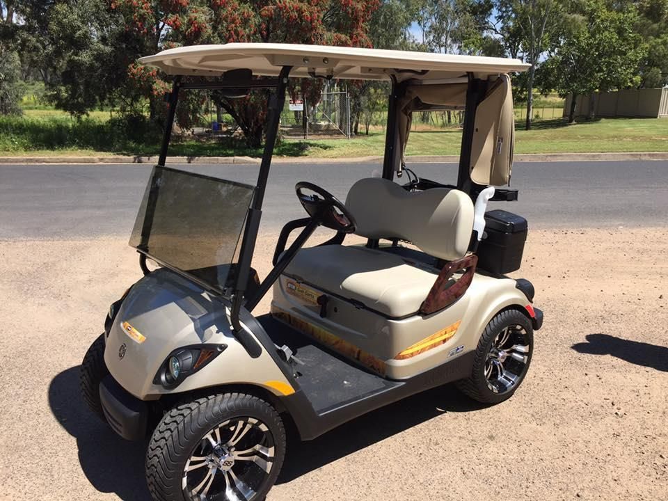 A Golf Cart Is Parked on The Side of The Road — DTM Tamworth in Armidale, NSW